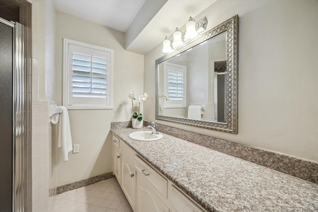 7810 Pagewood Ln, Houston, TX 77063 - full bathroom featuring tile patterned floors, a stall shower, vanity, and plenty of natural light