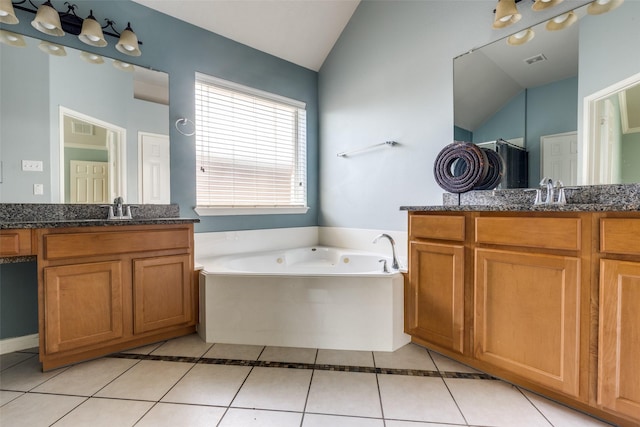 2803 Youpon Glen Way, Fresno, TX 77545 - full bath with lofted ceiling, two vanities, tile patterned floors, a garden tub, and a shower