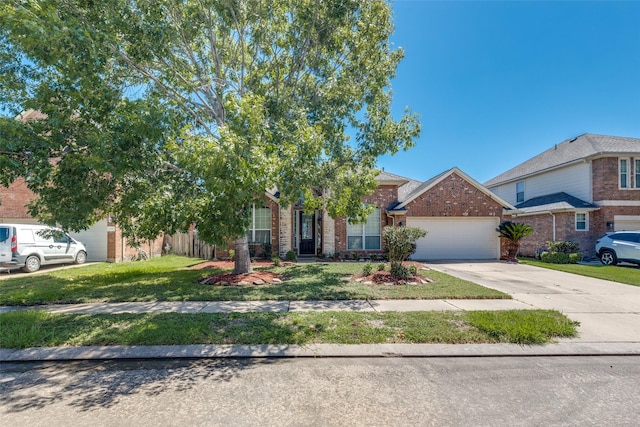2803 Youpon Glen Way, Fresno, TX 77545 - view of front of house featuring brick siding, an attached garage, concrete driveway, and a front yard