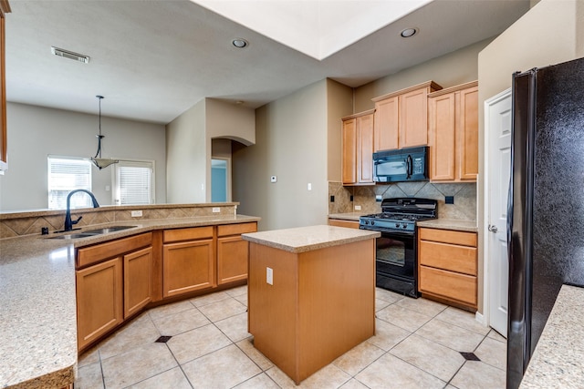 2803 Youpon Glen Way, Fresno, TX 77545 - kitchen featuring black appliances, a sink, decorative backsplash, arched walkways, and a center island