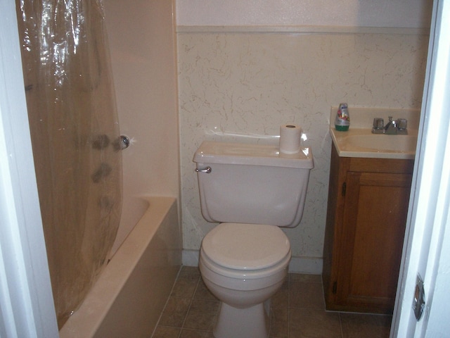3309 Avenue N, Galveston, TX 77550 - full bathroom with vanity, tile patterned flooring, and shower / bath combination