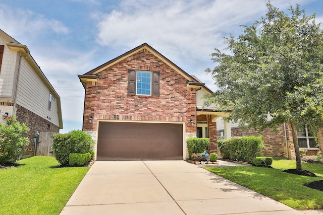 24710 Royal Pike Dr, Katy, TX 77493 - traditional-style house featuring brick siding, a garage, a front yard, and driveway