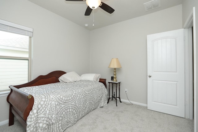 24710 Royal Pike Dr, Katy, TX 77493 - carpeted bedroom with baseboards and ceiling fan
