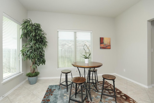24710 Royal Pike Dr, Katy, TX 77493 - dining space with light tile patterned floors and baseboards