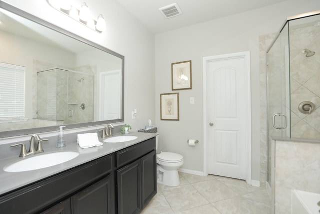 24710 Royal Pike Dr, Katy, TX 77493 - full bathroom with double vanity, a stall shower, tile patterned floors, a bathtub, and toilet