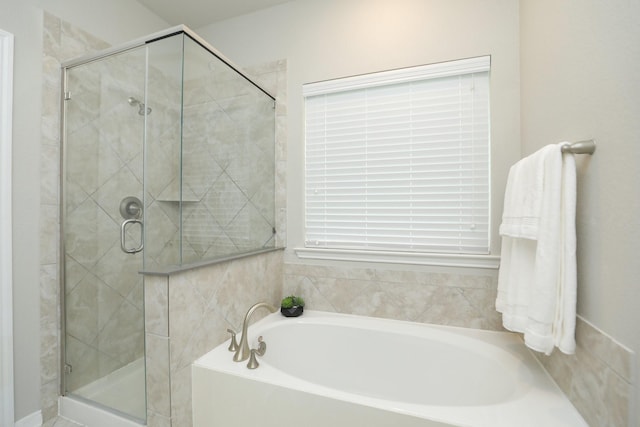 24710 Royal Pike Dr, Katy, TX 77493 - full bathroom with a bath and a shower stall