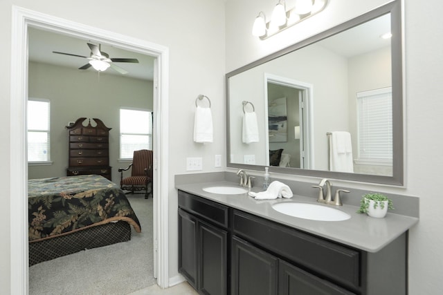 24710 Royal Pike Dr, Katy, TX 77493 - bathroom featuring ensuite bath, double vanity, plenty of natural light, and a ceiling fan