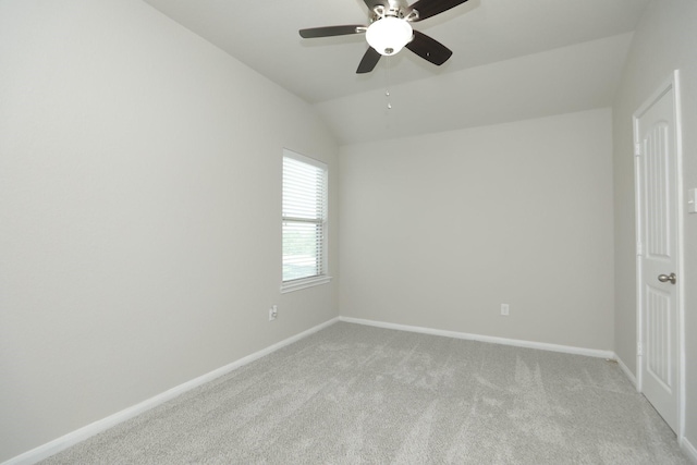 24710 Royal Pike Dr, Katy, TX 77493 - unfurnished bedroom with light colored carpet, vaulted ceiling, baseboards, and a ceiling fan