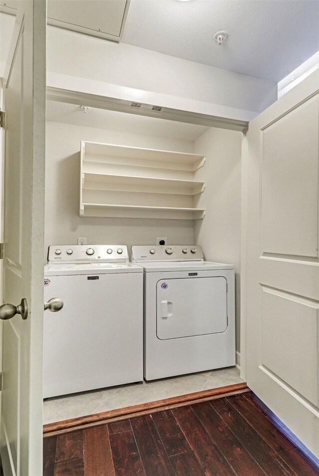 1011 Studemont St Unit 304, Houston, TX 77007 - washroom featuring washer and dryer and hardwood / wood-style floors