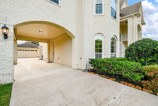 902 Delford Way, Sugar Land, TX 77479 - view of patio / terrace featuring concrete driveway