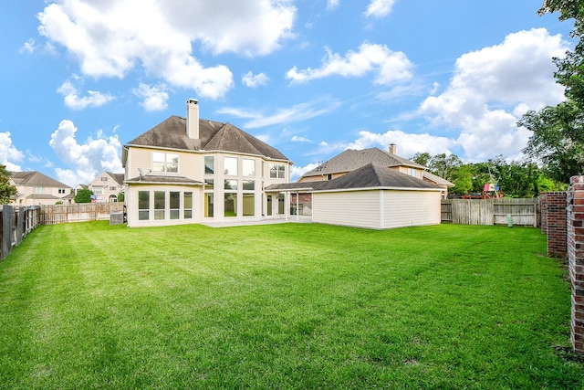 902 Delford Way, Sugar Land, TX 77479 - back of property featuring a chimney, central AC unit, and a sunroom