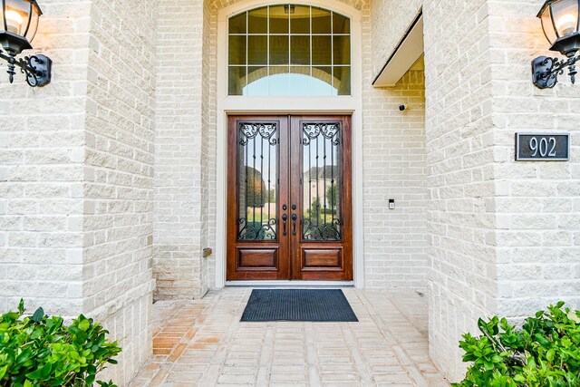902 Delford Way, Sugar Land, TX 77479 - property entrance with french doors and brick siding