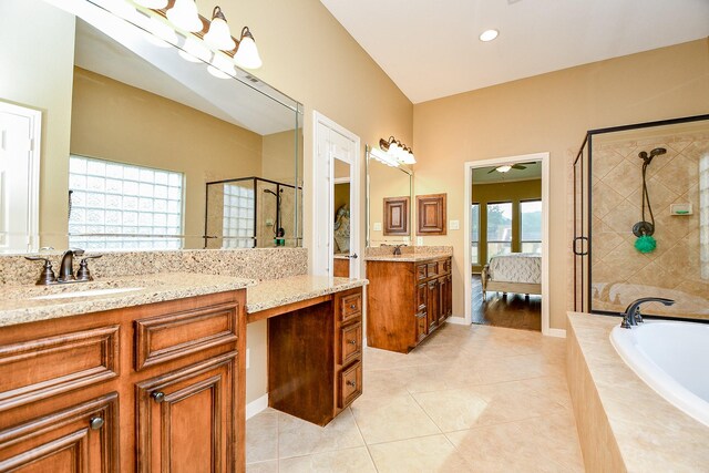 902 Delford Way, Sugar Land, TX 77479 - ensuite bathroom featuring a shower stall, two vanities, a garden tub, tile patterned flooring, and recessed lighting