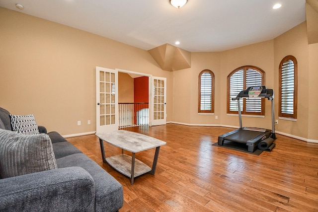 902 Delford Way, Sugar Land, TX 77479 - workout area featuring french doors, wood finished floors, baseboards, and recessed lighting