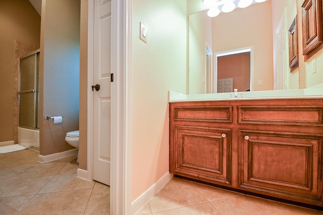 902 Delford Way, Sugar Land, TX 77479 - bathroom with tile patterned flooring, toilet, vanity, and bath / shower combo with glass door