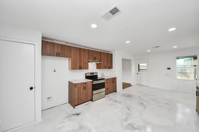 5419 N Crooked Creek Dr, Houston, TX 77017 - kitchen featuring electric stove, under cabinet range hood, light countertops, brown cabinetry, and recessed lighting