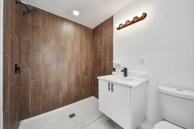5419 N Crooked Creek Dr, Houston, TX 77017 - bathroom with vanity, tiled shower, and toilet