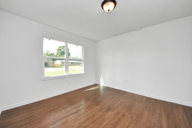 5419 N Crooked Creek Dr, Houston, TX 77017 - empty room with dark wood-style flooring and baseboards