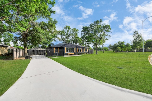 5419 N Crooked Creek Dr, Houston, TX 77017 - view of front of house featuring concrete driveway and a gate