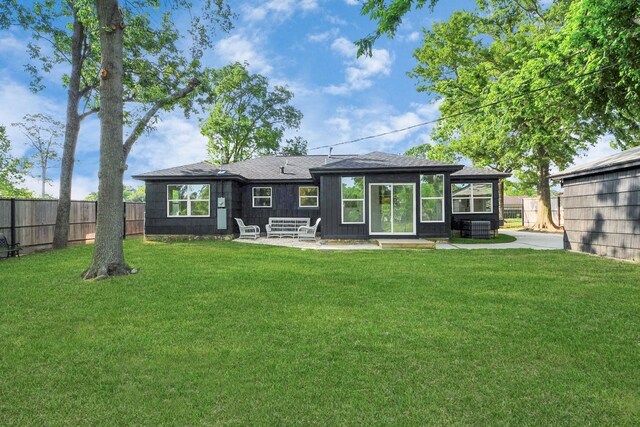 5419 N Crooked Creek Dr, Houston, TX 77017 - back of property with a patio area and central AC unit