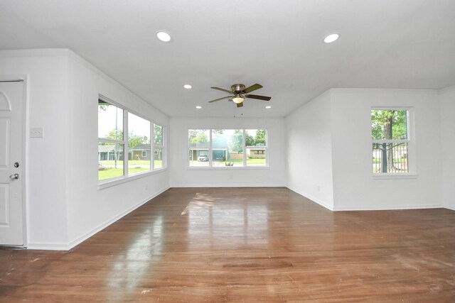 5419 N Crooked Creek Dr, Houston, TX 77017 - unfurnished living room with healthy amount of natural light, ceiling fan, baseboards, recessed lighting, and wood finished floors