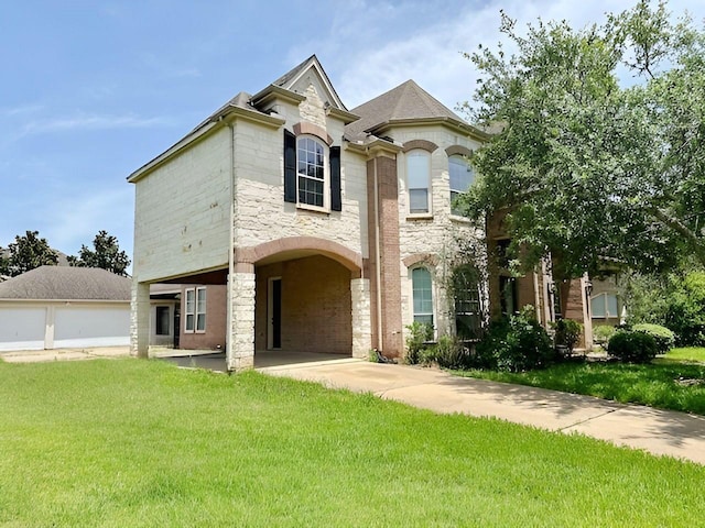 3003 Mystic Frst, Missouri City, TX 77459 - view of front facade featuring a front yard and stone siding