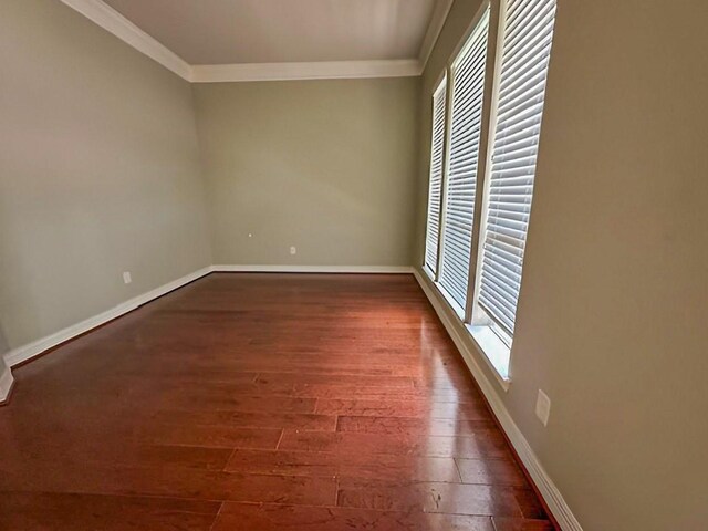 3003 Mystic Frst, Missouri City, TX 77459 - spare room with crown molding, baseboards, and wood finished floors
