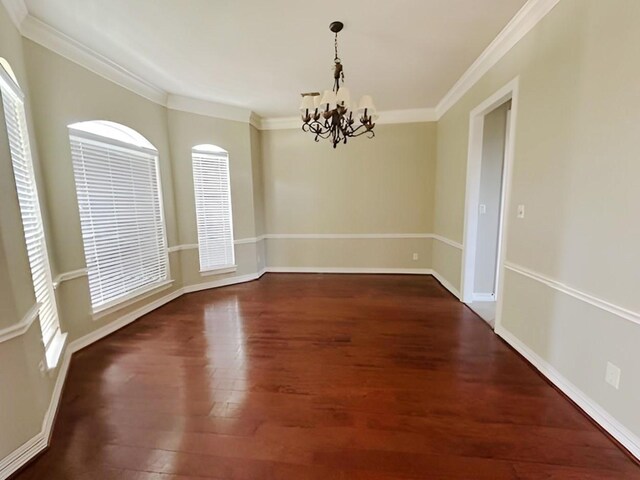 3003 Mystic Frst, Missouri City, TX 77459 - unfurnished dining area featuring a chandelier, wood finished floors, ornamental molding, and baseboards