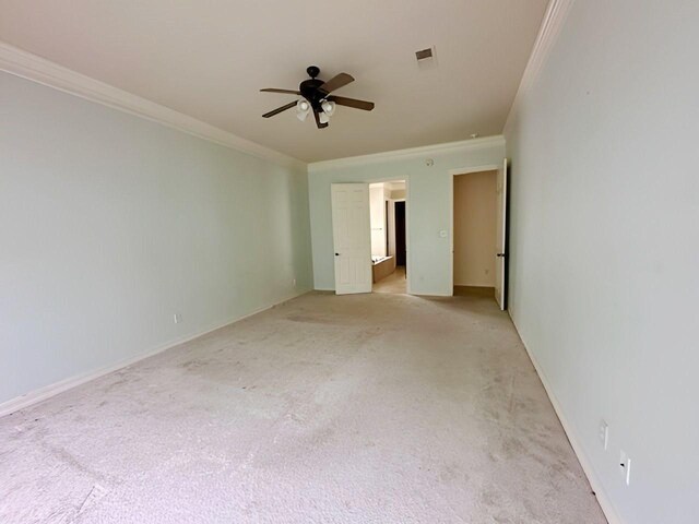 3003 Mystic Frst, Missouri City, TX 77459 - empty room featuring ornamental molding, light colored carpet, ceiling fan, and baseboards