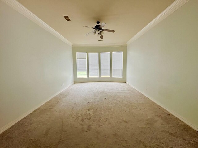 3003 Mystic Frst, Missouri City, TX 77459 - empty room featuring ceiling fan, crown molding, carpet floors, and baseboards