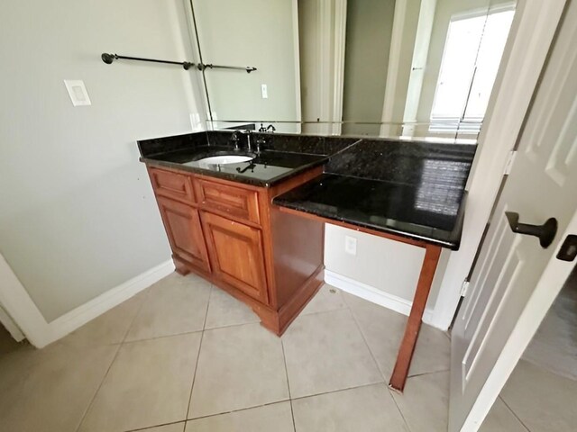 3003 Mystic Frst, Missouri City, TX 77459 - bathroom with vanity, baseboards, and tile patterned flooring