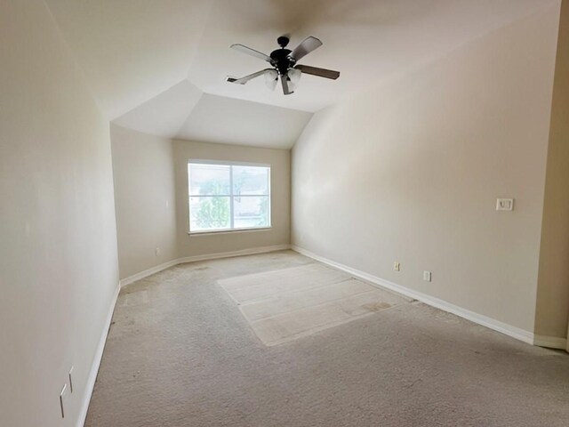 3003 Mystic Frst, Missouri City, TX 77459 - unfurnished room featuring light colored carpet, baseboards, ceiling fan, and vaulted ceiling