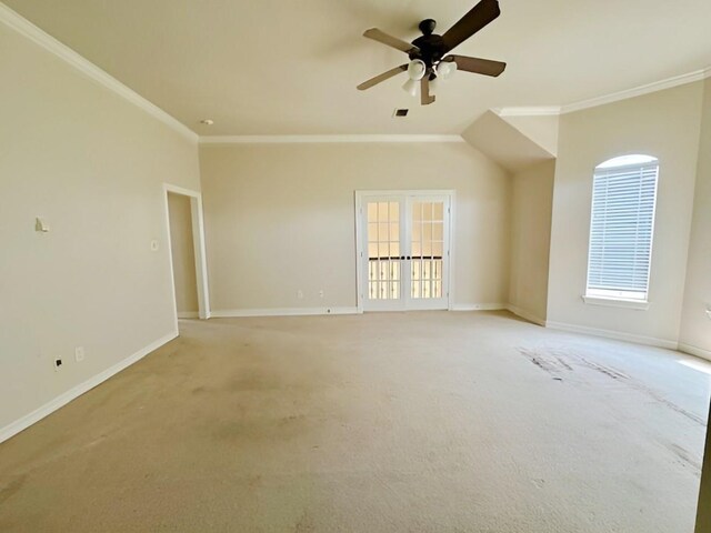 3003 Mystic Frst, Missouri City, TX 77459 - unfurnished room featuring crown molding, ceiling fan, baseboards, light colored carpet, and french doors