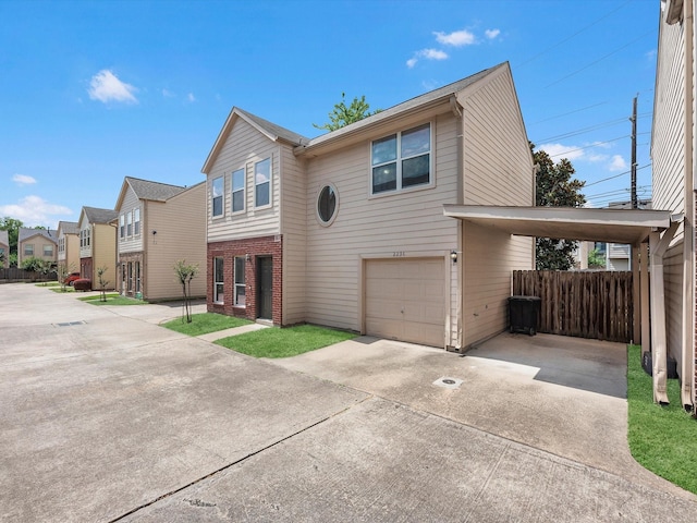 2234 Naomi St, Houston, TX 77054 - traditional home featuring concrete driveway, brick siding, a carport, a residential view, and an attached garage