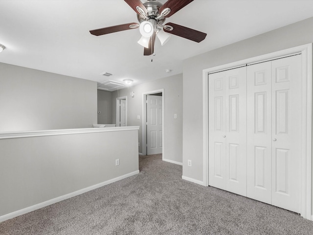 2234 Naomi St, Houston, TX 77054 - unfurnished bedroom with carpet flooring, attic access, baseboards, a closet, and a ceiling fan