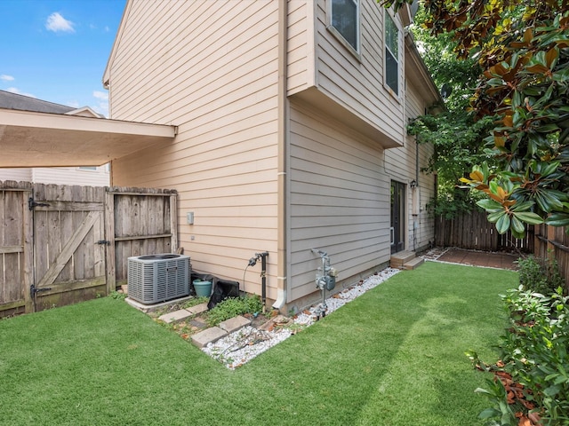 2234 Naomi St, Houston, TX 77054 - view of property exterior featuring central AC unit, a gate, and entry steps
