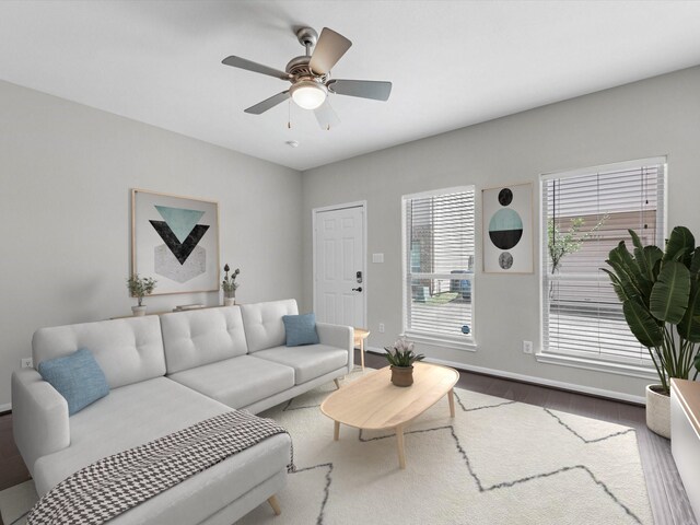 2234 Naomi St, Houston, TX 77054 - living room with wood finished floors, ceiling fan, and baseboards