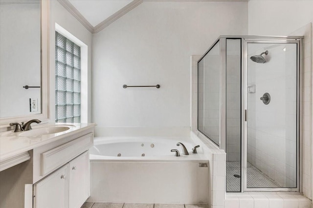 2263 Austin St, Houston, TX 77002 - bathroom with a tub with jets, a stall shower, vanity, healthy amount of natural light, and crown molding