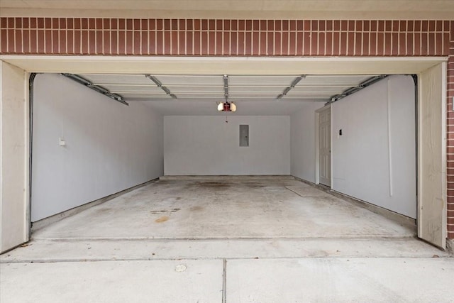 2263 Austin St, Houston, TX 77002 - garage with a garage door opener and electric panel