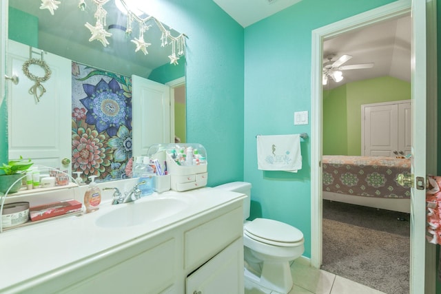 13814 Swan Hollow Ln, Houston, TX 77041 - ensuite bathroom featuring vaulted ceiling, vanity, tile patterned floors, toilet, and a ceiling fan