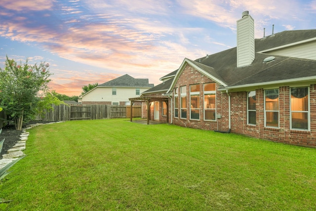 13814 Swan Hollow Ln, Houston, TX 77041 - yard at dusk with a patio