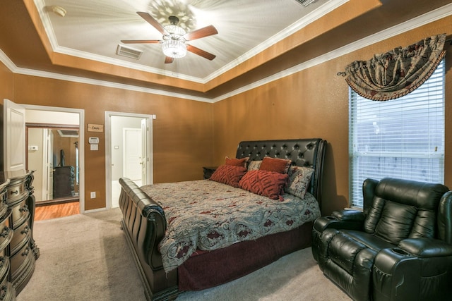13814 Swan Hollow Ln, Houston, TX 77041 - bedroom with light colored carpet, a tray ceiling, crown molding, and ceiling fan