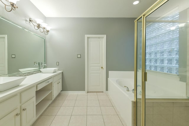 13814 Swan Hollow Ln, Houston, TX 77041 - full bathroom with double vanity, a garden tub, tile patterned flooring, a stall shower, and recessed lighting