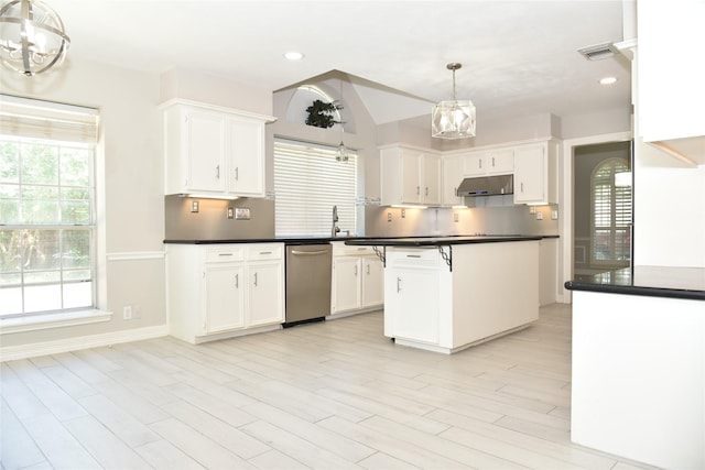 14103 Owens Rd, Houston, TX 77095 - kitchen featuring a chandelier, stainless steel dishwasher, dark countertops, white cabinets, and recessed lighting