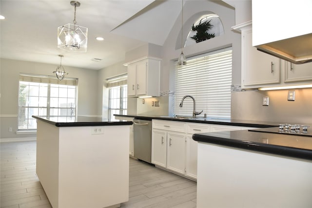 14103 Owens Rd, Houston, TX 77095 - kitchen with dishwasher, a sink, a kitchen island, a chandelier, and light wood-style flooring