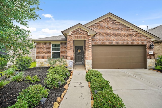 11607 Brookside Arbor Ln, Richmond, TX 77406 - single story home with brick siding, an attached garage, and stone siding