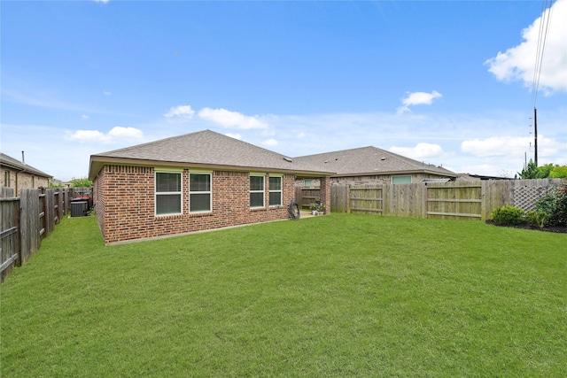 11607 Brookside Arbor Ln, Richmond, TX 77406 - rear view of property with central air condition unit, brick siding, and a shingled roof