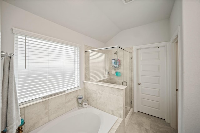 11607 Brookside Arbor Ln, Richmond, TX 77406 - full bathroom featuring a bath, a shower stall, and lofted ceiling