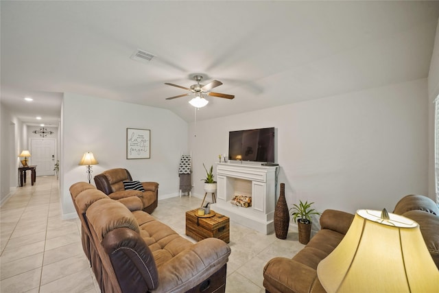 11607 Brookside Arbor Ln, Richmond, TX 77406 - living area featuring light tile patterned flooring, ceiling fan, baseboards, and a fireplace