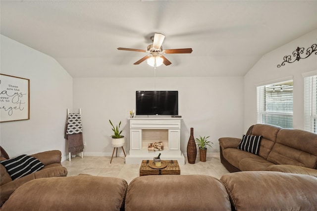 11607 Brookside Arbor Ln, Richmond, TX 77406 - living area with vaulted ceiling, ceiling fan, and a fireplace with raised hearth